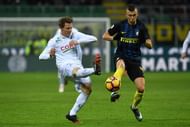 MILAN, ITALY - JANUARY 14:  Ivan Perisic (R) of FC Internazionale is challenged by Nicolas Sebastien Frey of AC ChievoVerona during the Serie A match between FC Internazionale and AC ChievoVerona at Stadio Giuseppe Meazza on January 14, 2017 in Milan, Italy.  (Photo by Valerio Pennicino/Getty Images)